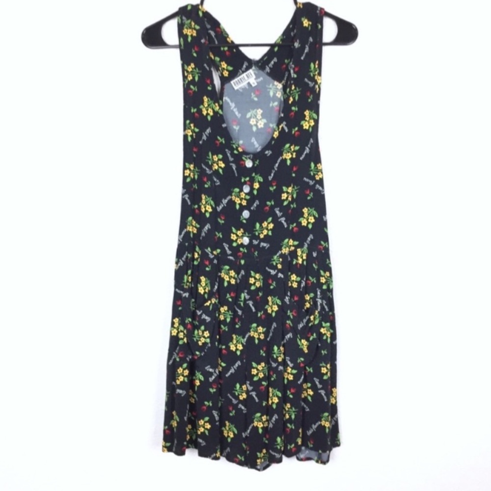 Vintage oversized floral print button front romper size small whimsigoth grunge